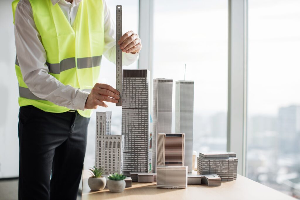 Cropped view of hands of engineer working on building complex prototype project