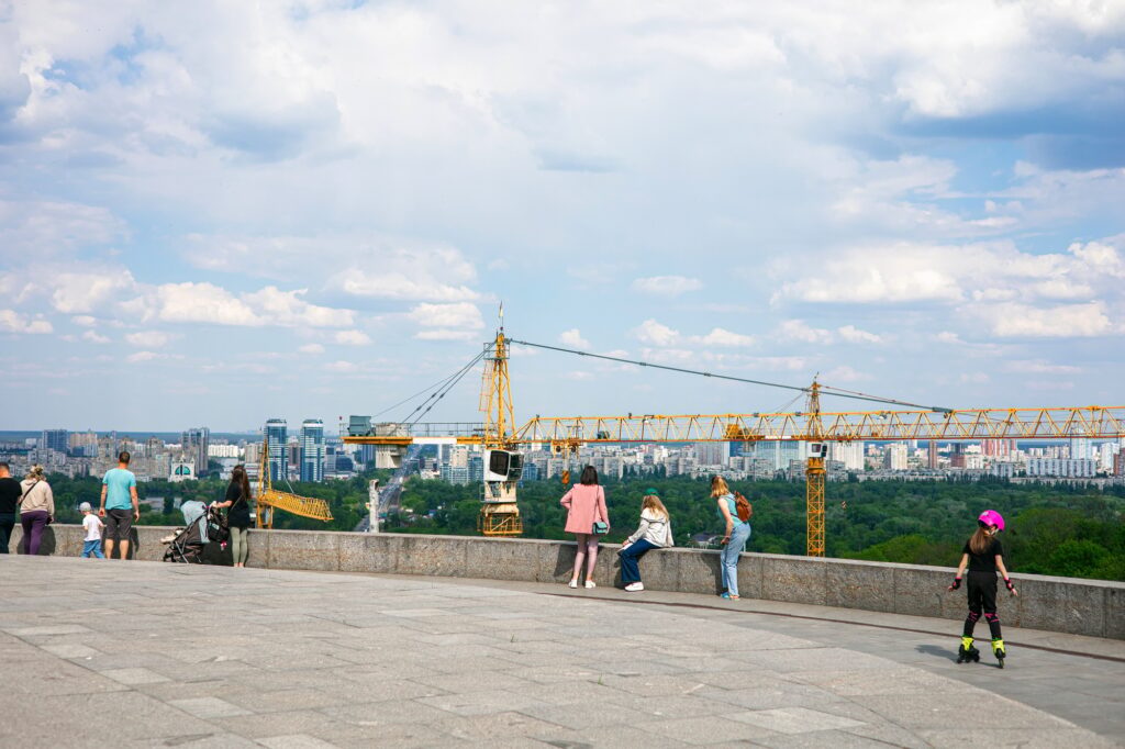 Working crane in the sky. Construction site. development in Kyiv city, overlooking from Observation